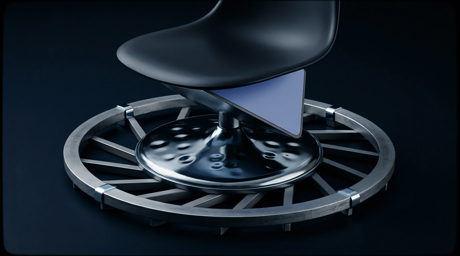 An industrial render displays a moulded black polymer seat shell mounted on a polished metallic pedestal and circular spoke turntable structure.